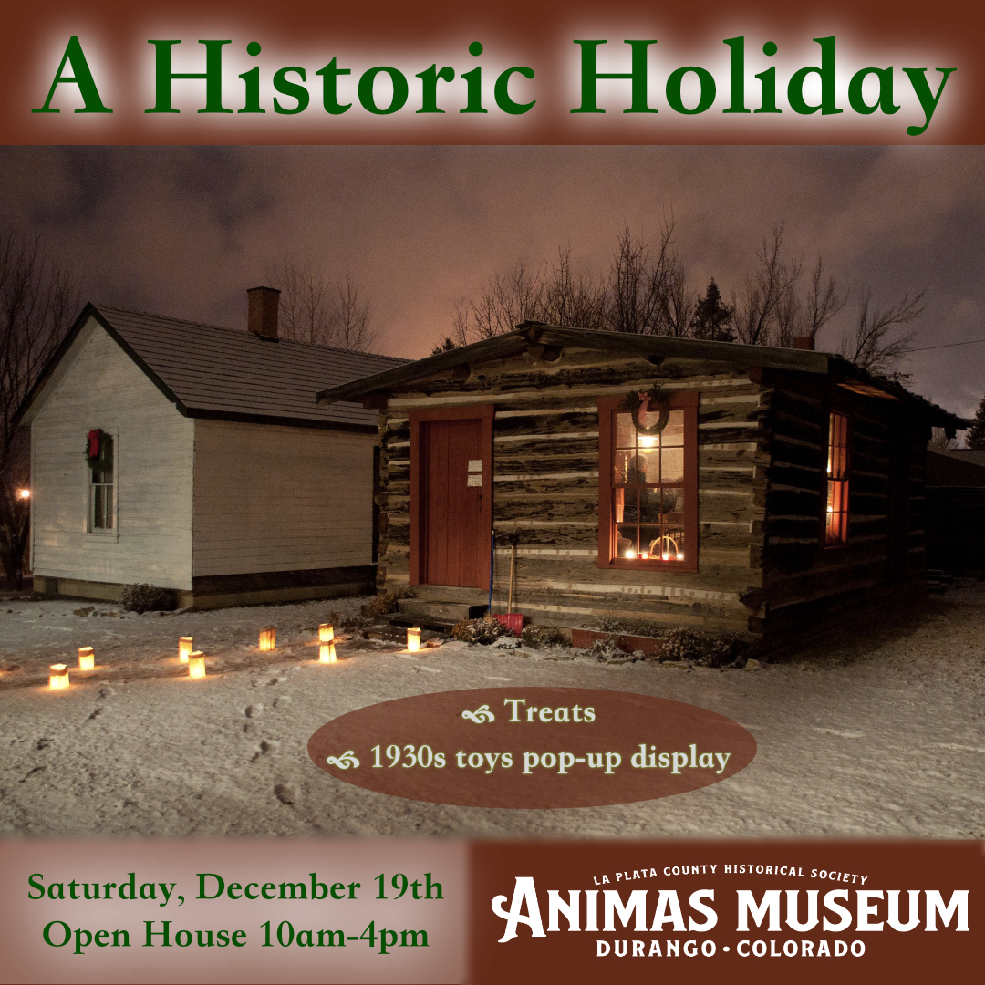 image of the Joy Cabin and Peterson House at the holdays